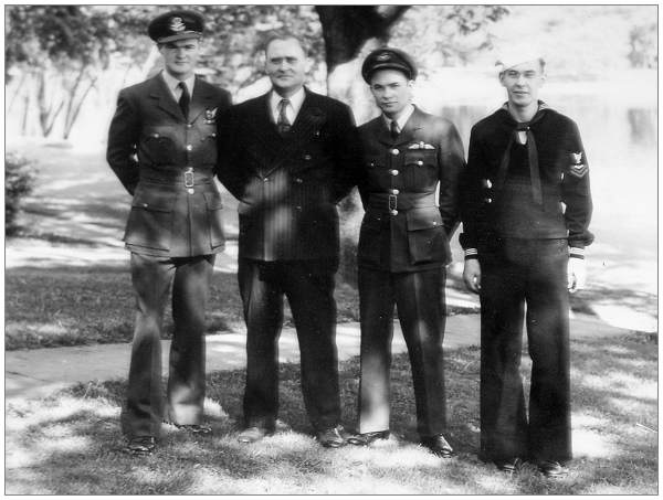 Douglas with his dad John and brothers Earl and Sydney, 1945