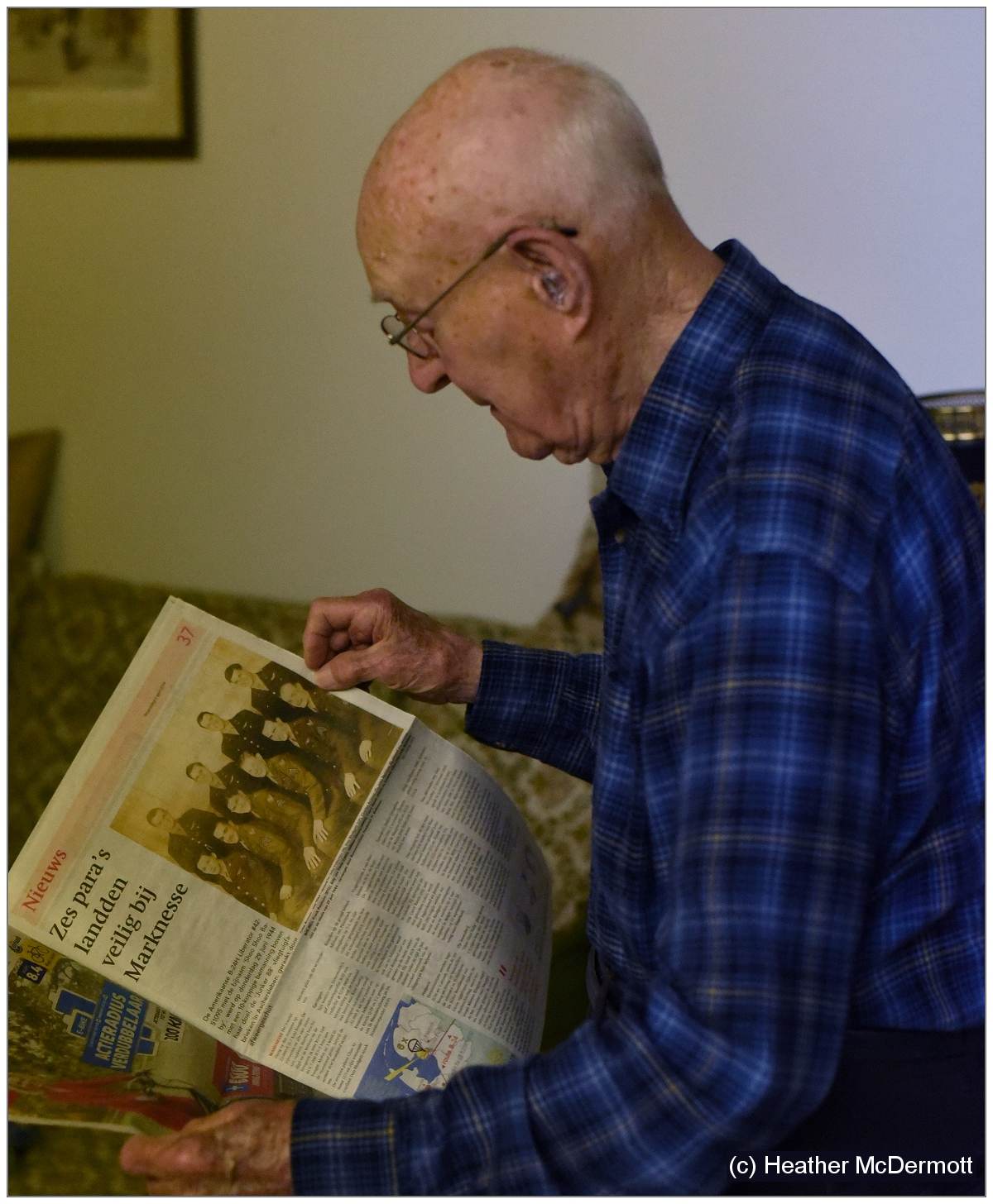 Everett (98) with newspaper