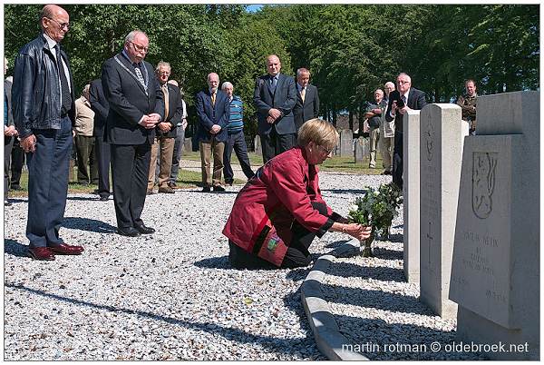 01Jun 2011 - Gail places flowers at her father's grave - photo by Martin Rotman