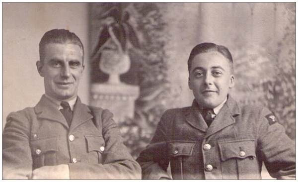 Sgt. John Noel Waddington with fellow reqruit (left)