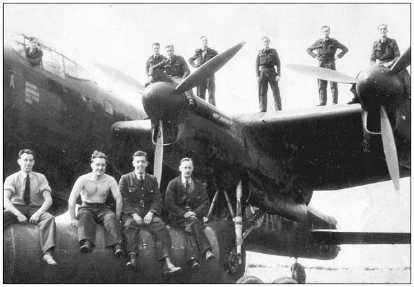 Sgt. John Johnstone Sloan - 3rd Right - on wing - likely summer 1943, Elsham Wolds