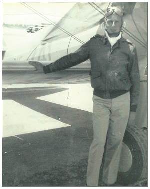 LeRoy Meredith Hansen near biplane