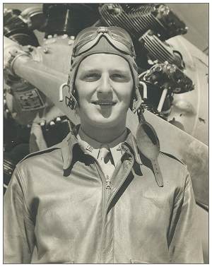 LeRoy Meredith Hansen near biplane