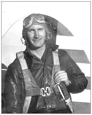 2nd Lt. James E. Barlow near aircraft