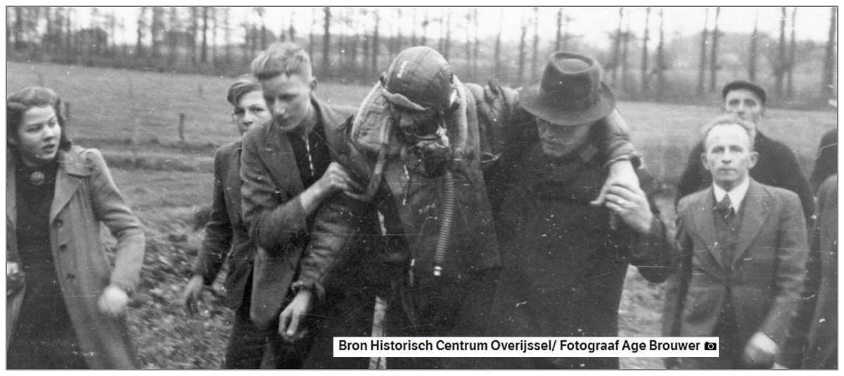 Injured S/Sgt. Harlan Shoemaker Mann supports by local residents - Tuesday 11 Jan 1944