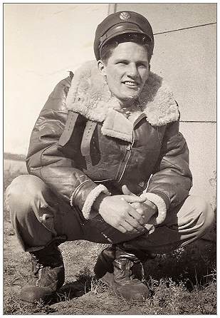 S/Sgt. Roger Walter Collins - Tail Turret Gunner - Roger somewhere in England, date unknown, likely 1943